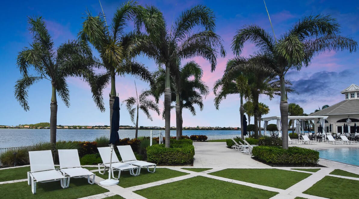 Corkscrew Shores pool and 240-acre lake at sunset