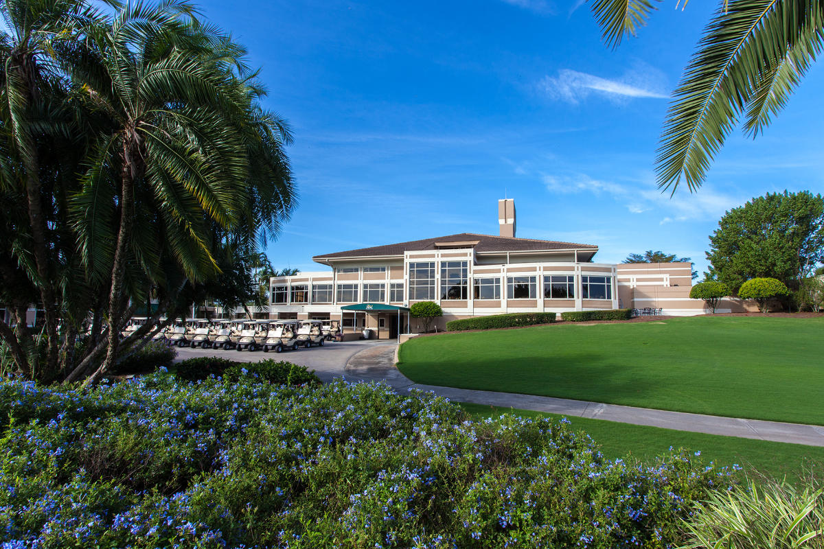 Wildcat Run formal dining room floor-to-ceiling windows golf course views